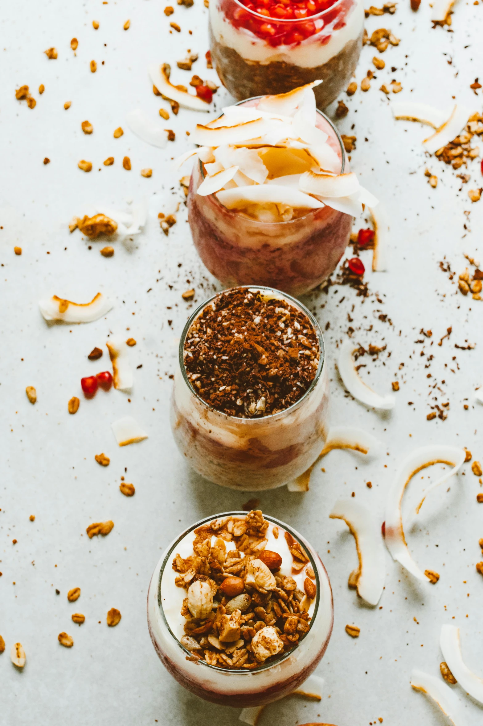 a group of desserts sitting on top of a table, inside a glass jar, coconuts, highly upvoted, thumbnail