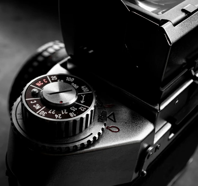 a black and white photo of a camera, by Adam Rex, dials, medium format color photography, ((sharp focus)), high angle camera