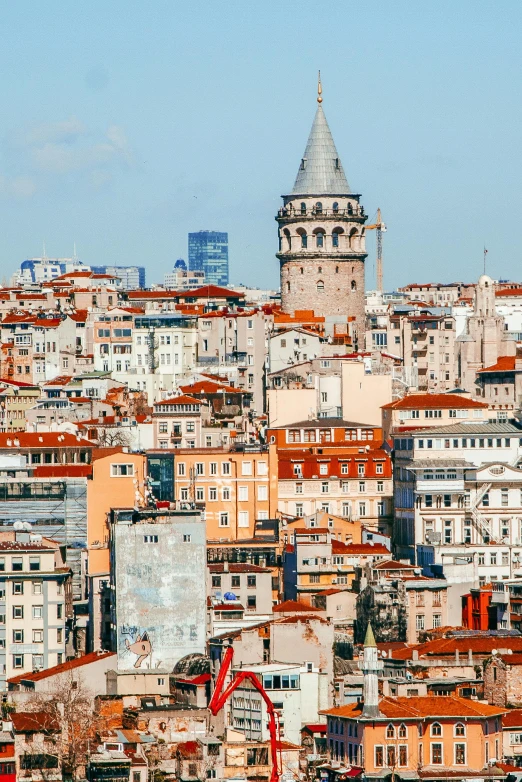 a city filled with lots of tall buildings, pexels contest winner, art nouveau, ottoman sultan, red roofs, slide show, 2022 photograph