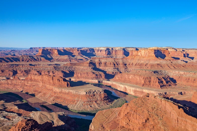 a canyon with a river running through it, moab, avatar image