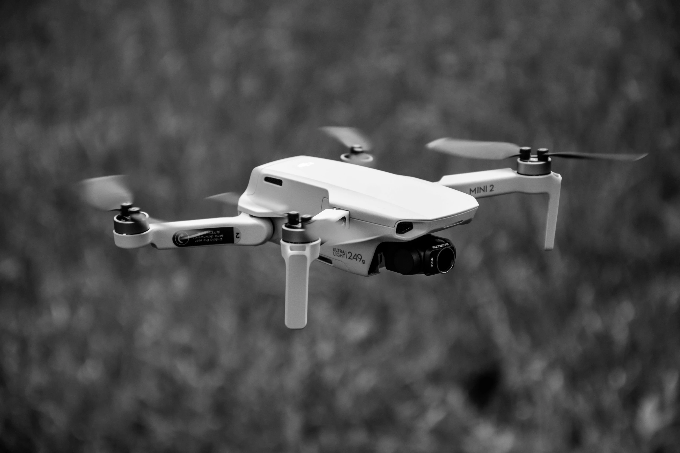 a black and white photo of a small drone, unsplash, visual art, hunting, realistic footage, 2 0 2 2 photo, toy photo