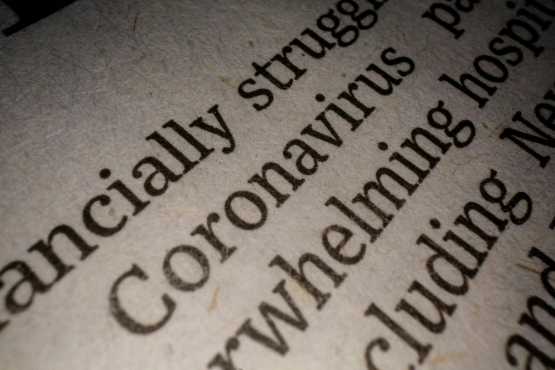 a close up of a text on a piece of paper, coronavirus, readability, sprawling, dramatic news