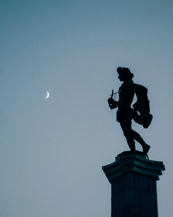 a clock tower with a statue on top of it, by Attila Meszlenyi, unsplash contest winner, neoclassicism, crescent moon, tom holland as peter pan, ☁🌪🌙👩🏾, greek statue