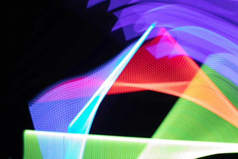 a close up of a colorful light painting, inspired by Gabriel Dawe, unsplash, generative art, night clubs and neons, looking left, siggraph, motion graphic