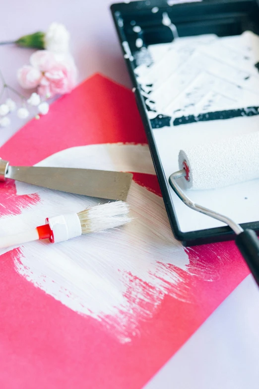 a pair of scissors sitting on top of a piece of paper, a silk screen, by Julia Pishtar, trending on pexels, arbeitsrat für kunst, candy treatments, white and pink cloth, thick paint brush strokes, tin foiling