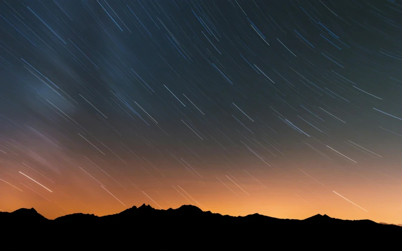 a long exposure photo of the night sky, a picture, unsplash contest winner, romanticism, mount olympus, thin straight lines, orange and blue sky, rugged | stars