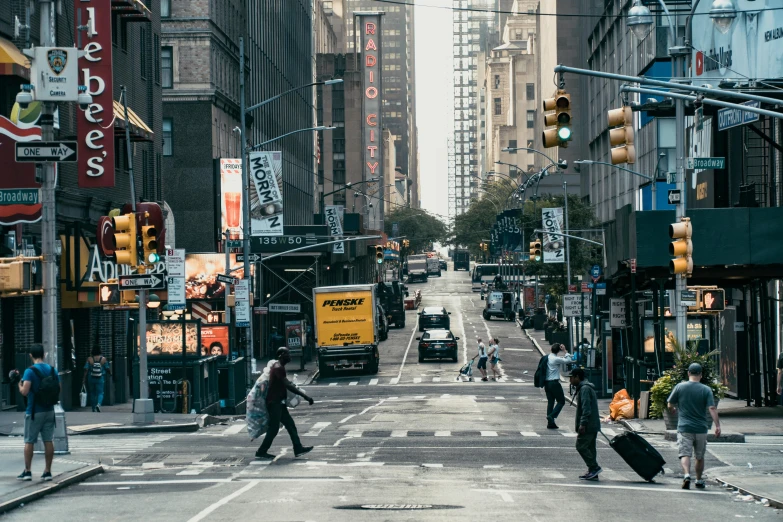 a group of people walking across a street, by Carey Morris, pexels contest winner, new york background, complex scene, clean streets