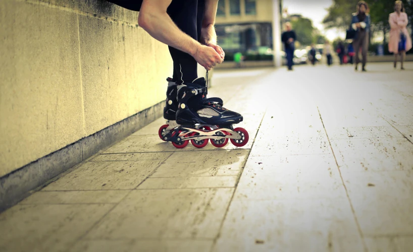 a person riding a skateboard down a sidewalk, by Matthias Stom, unsplash, rollerblades, paisley, closeup portrait shot, taken in the late 2010s