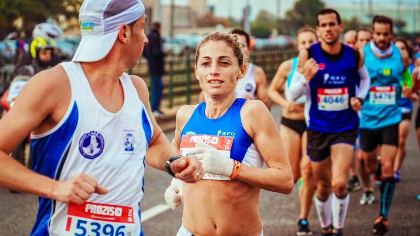 a couple of people that are running in a race, a portrait, by Giorgio Cavallon, pexels contest winner, half woman, 🚿🗝📝