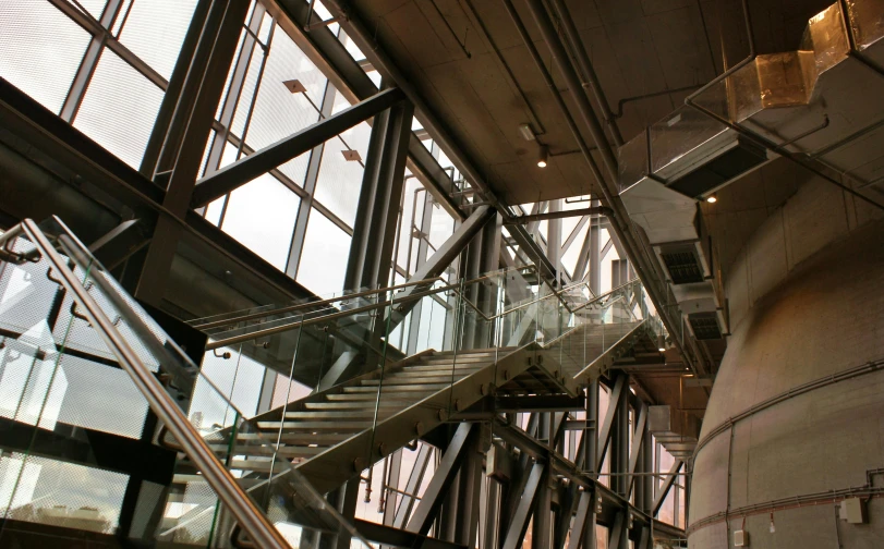 a close up of a set of stairs in a building, norman foster, “ iron bark, inside iron and machines, sky bridge