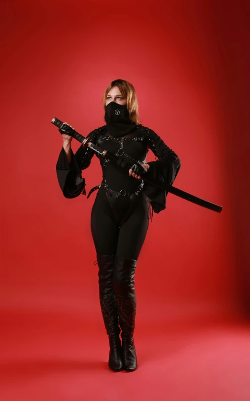 a woman in a black outfit holding a sword, ninja outfit, 💣 💥💣 💥, diverse costumes, 2019 trending photo