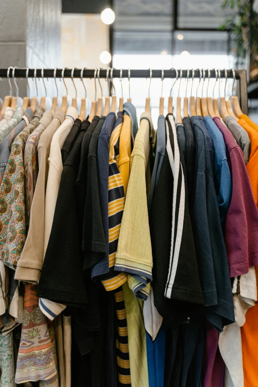 a rack of clothes in a clothing store, by Nicolette Macnamara, daniel richter, up-close, from the 7 0 s, various colors