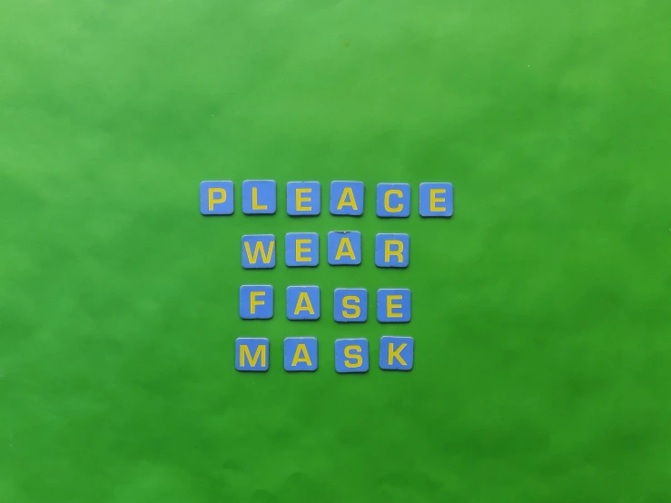 the words please wear ease mask on a green background, assemblage, style of the game rimworld, blue faces, square face, face down
