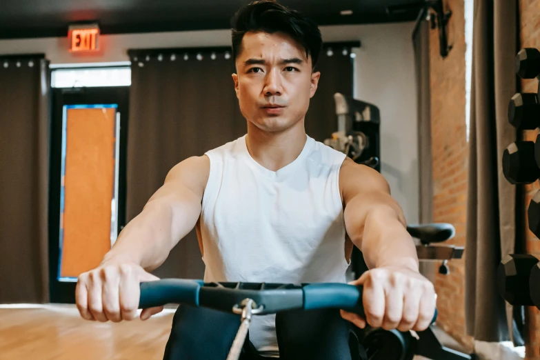 a man sitting on a stationary bike in a gym, a portrait, inspired by Ryan Yee, pexels contest winner, shin hanga, avatar image