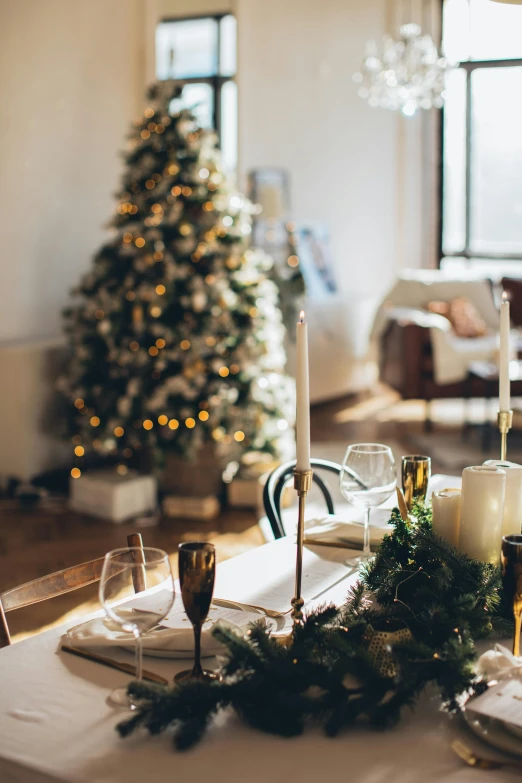 a dining room table with a christmas tree in the background, pexels contest winner, baroque, natural light in room, thumbnail, sparkling, 10k