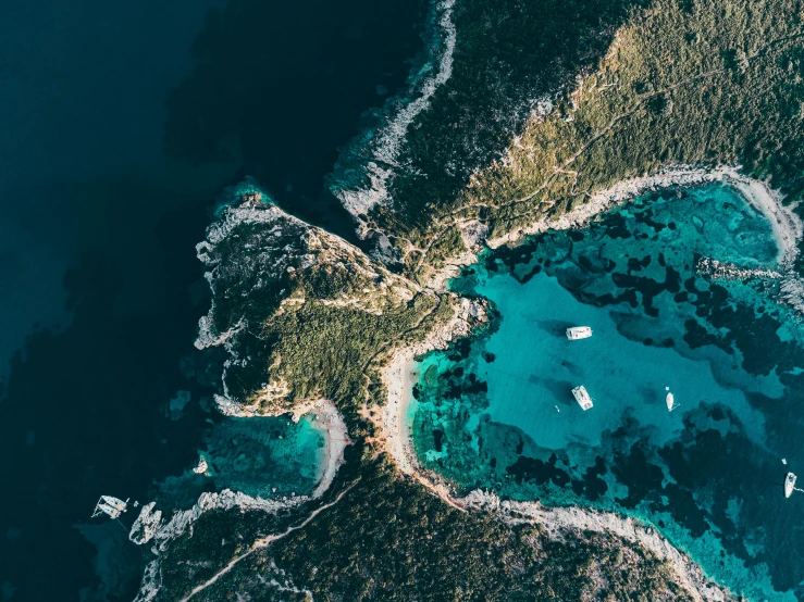 an aerial view of a large body of water, a screenshot, pexels contest winner, greek setting, sparkling cove, thumbnail, conde nast traveler photo