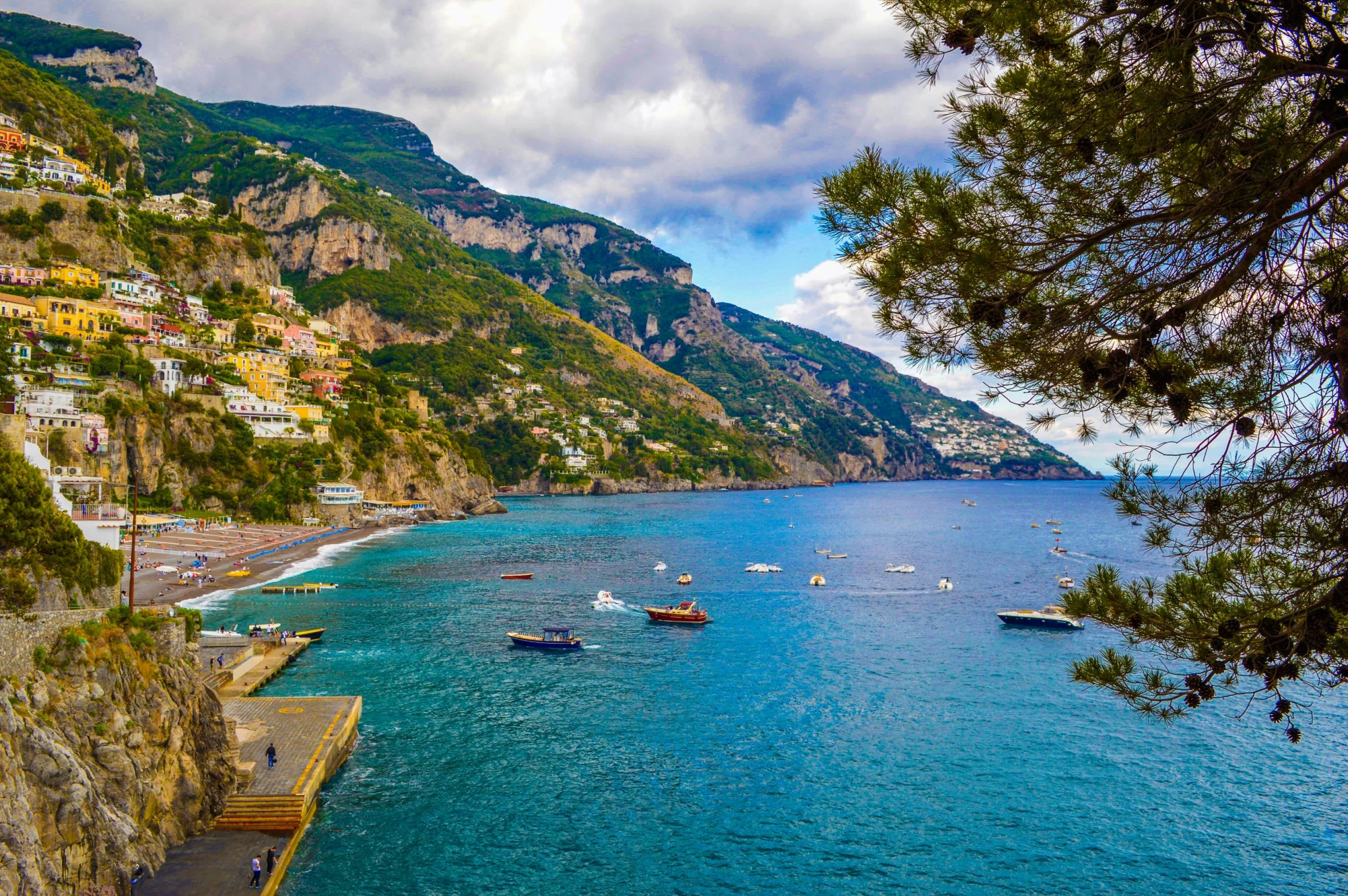 a group of boats floating on top of a body of water, by Julia Pishtar, pexels contest winner, renaissance, coastal cliffs, slim aarons, sweeping vista, 🎀 🗡 🍓 🧚