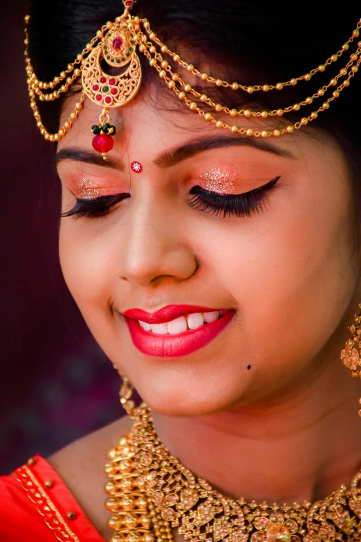 a woman in a red sari and gold jewelry, by Sudip Roy, trending on pixabay, samikshavad, face detailing, square, wedding, golden hour closeup photo