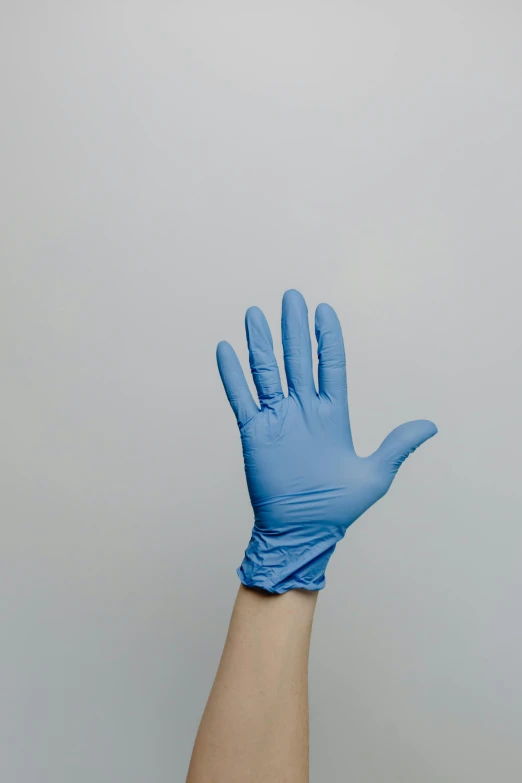 a person's hand wearing a blue glove, medical supplies, thumbnail, the culture, upper body image