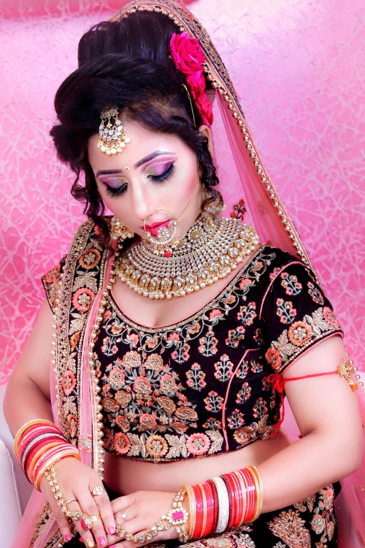 a woman in a black and pink outfit sitting on a couch, a portrait, inspired by Saurabh Jethani, trending on pixabay, bride, heavy make up, neck, snapchat photo