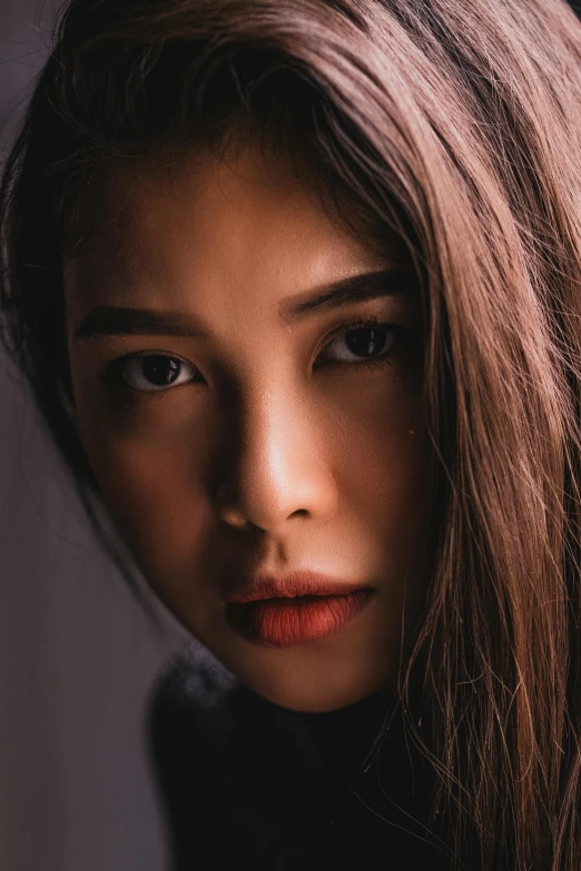 a close up of a woman with long hair, trending on pexels, asian beautiful face, portrait lighting, perfect face and boy, pouty face