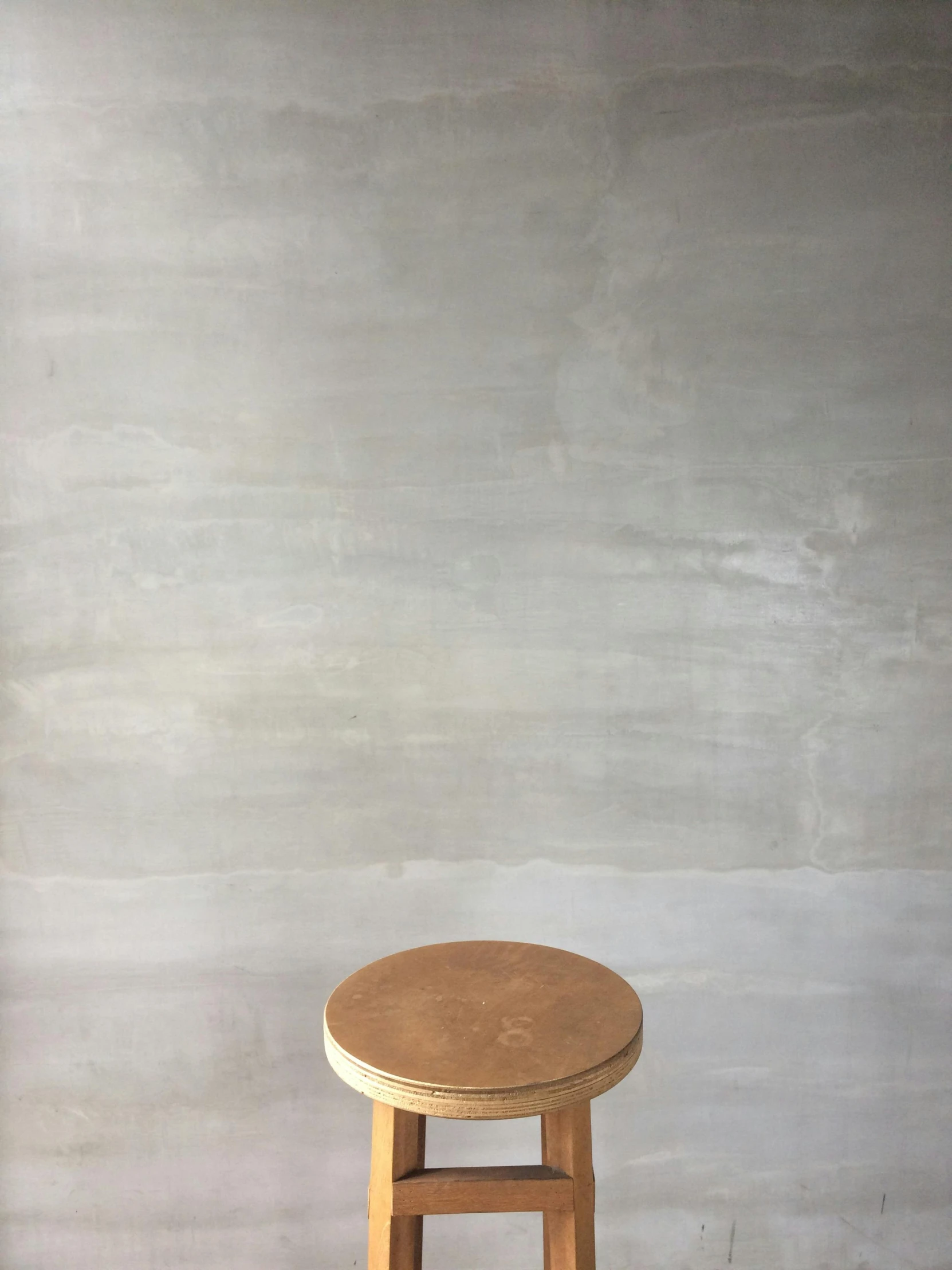 a wooden stool sitting in front of a wall, by Simon Gaon, koji morimoto shinjuku, by greg rutkowski, jen atkin