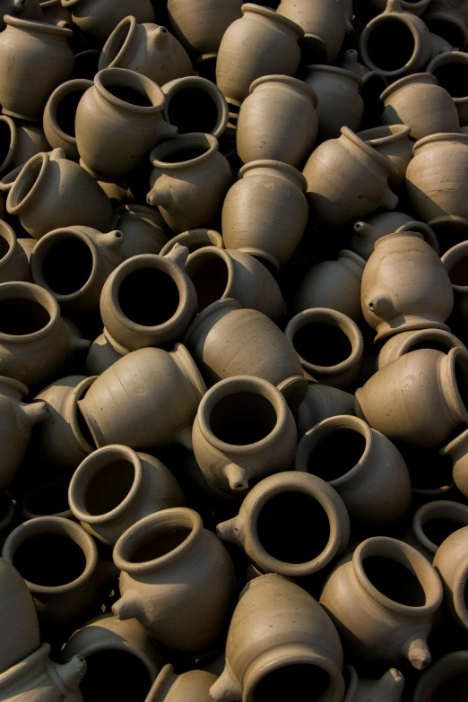 a pile of clay pots sitting on top of each other, by Ai Weiwei, flickr, ap photo, india, overhead, promo image
