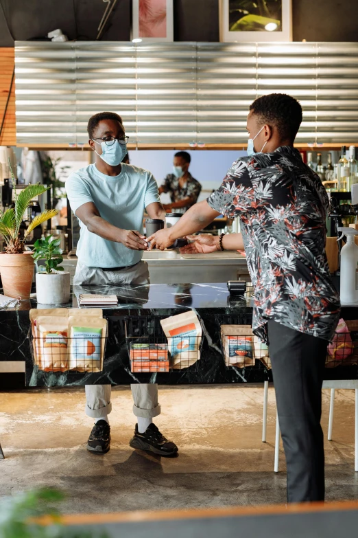 two men shaking hands in a restaurant, wearing facemask and sunglasses, botanicals, teddy fresh, essence