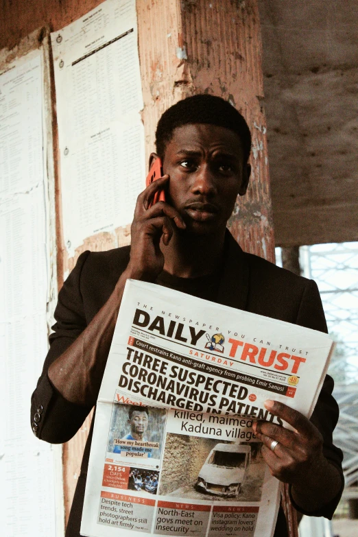 a man holding a newspaper while talking on a cell phone, an album cover, pexels contest winner, dada, david uzochukwu, trustworthy eyes, actress, busted