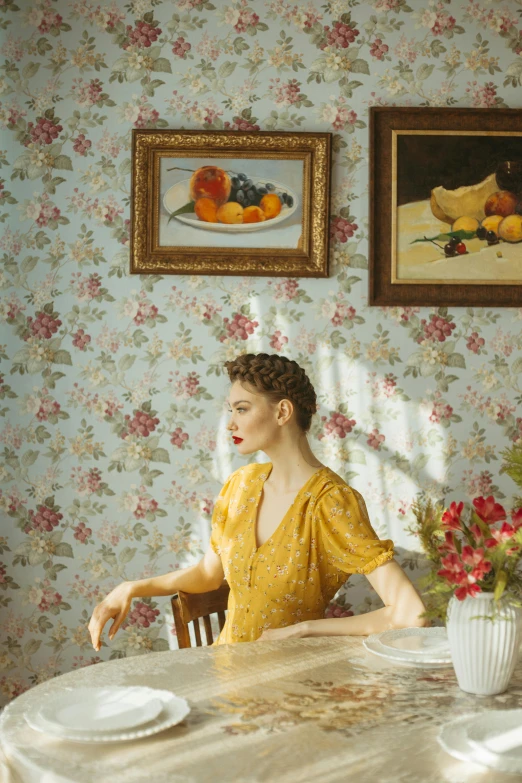 a woman in a yellow dress sitting at a table, inspired by William McGregor Paxton, unsplash contest winner, magic realism, wearing yellow floral blouse, at home, dressed like in the 1940s, julia gorokhova