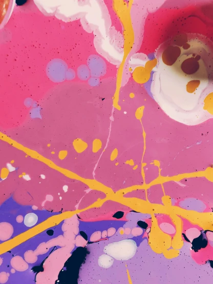 a close up of a plate of food on a table, inspired by Shōzō Shimamoto, abstract expressionism, ((pink)), yellow purple, album cover, helene frankenthaler