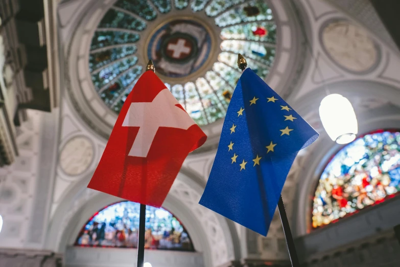 a couple of flags sitting next to each other, by Julia Pishtar, pexels, viennese actionism, swiss design, european union, 2 5 6 x 2 5 6 pixels, 🚿🗝📝