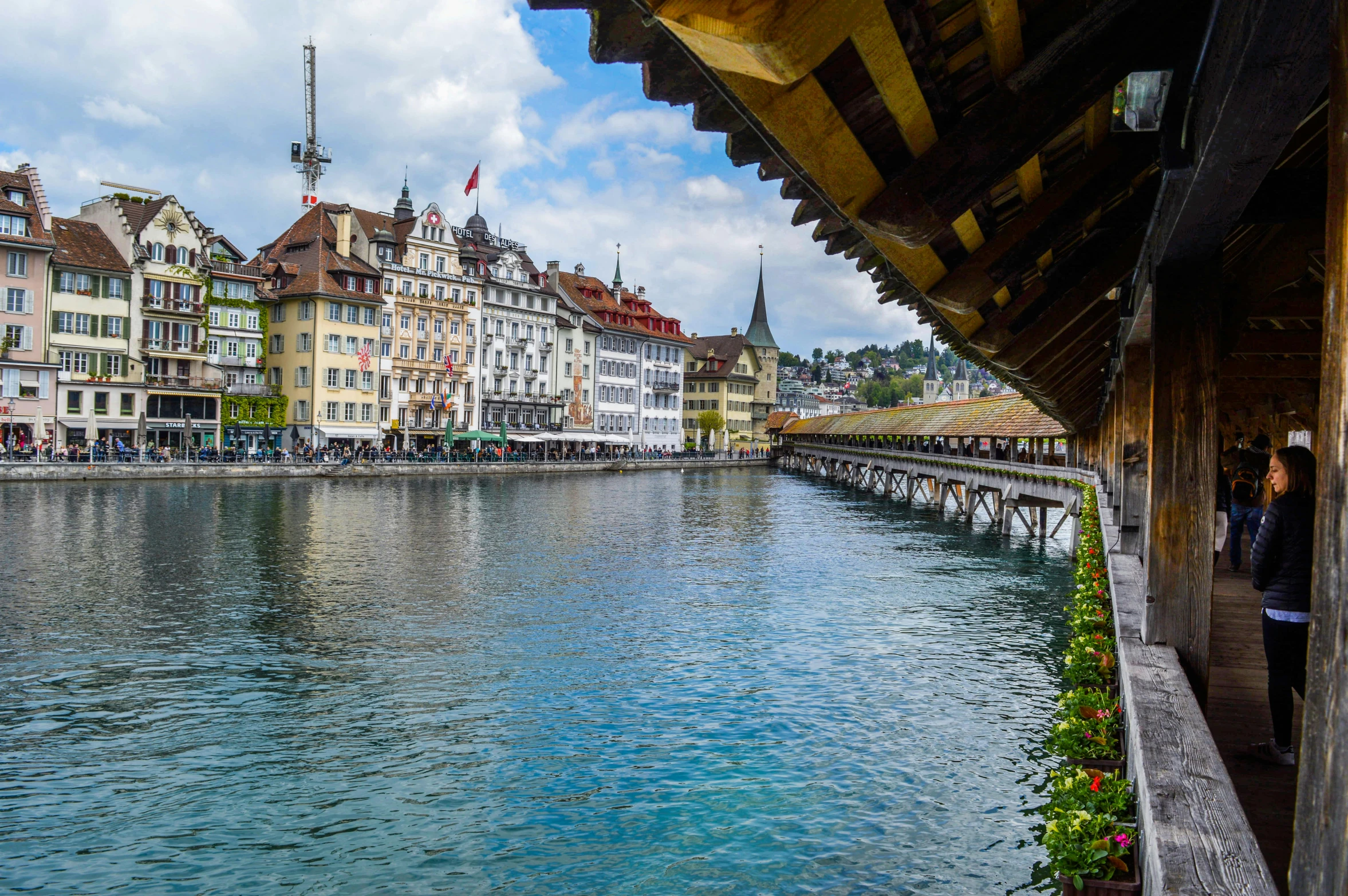 a number of buildings near a body of water, inspired by Karl Stauffer-Bern, pexels contest winner, renaissance, under bridge, colorful caparisons, brown, slide show