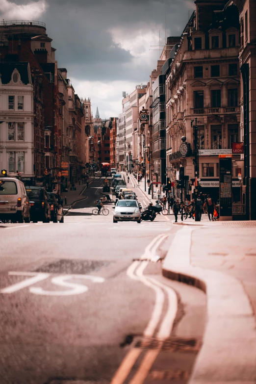 a street filled with lots of traffic next to tall buildings, by IAN SPRIGGS, pexels contest winner, renaissance, nineteenth century london, van, prefecture streets, round-cropped