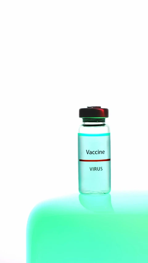 a bottle of vaccine sitting on top of a table, conceptual art, thumbnail, high key, vaccaro, virus