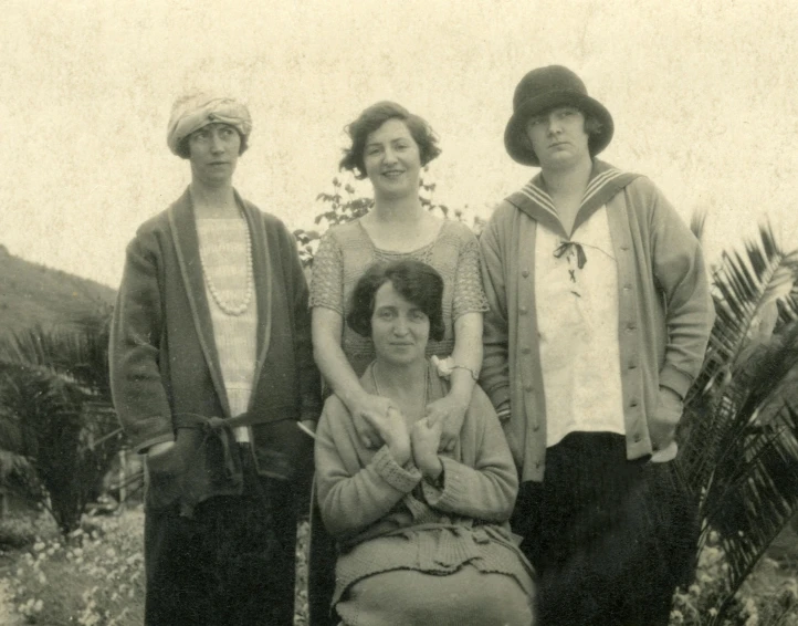 a group of people standing next to each other, a black and white photo, inspired by Frances Hodgkins, annie swynnerton, posing for the camera, circa 1 9 2 4, female looking