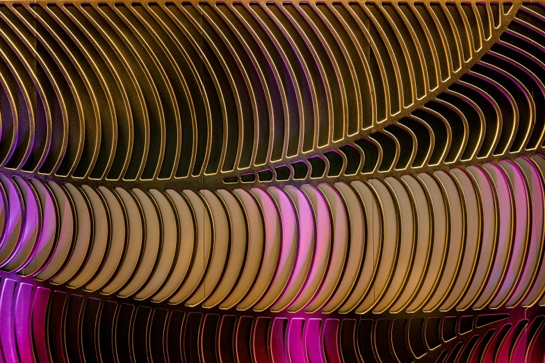 a group of chairs stacked on top of each other, an abstract sculpture, by Jan Rustem, flickr, computer art, pink and gold color scheme, waves of lights, brown and magenta color scheme, circles