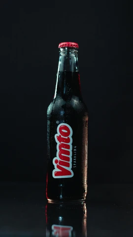 a bottle of soda sitting on top of a table, by Kuno Veeber, vivid studio light, vanta black, promo image, brown