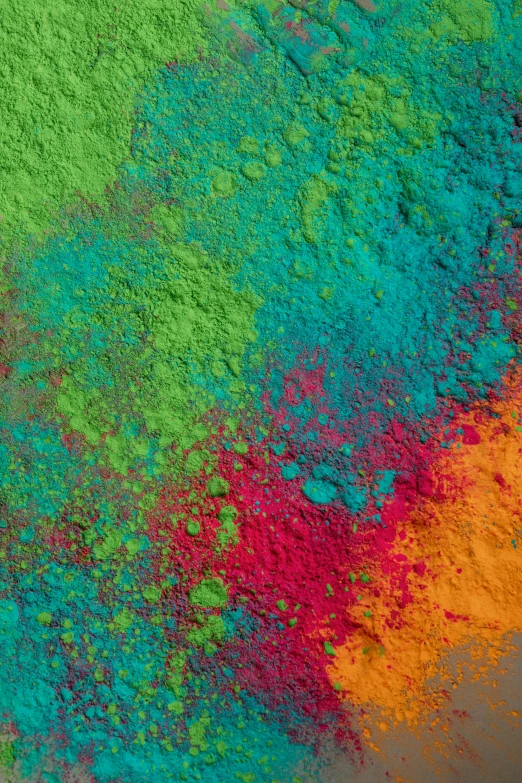 a pile of colored powder sitting on top of a table, inspired by John Hoyland, trending on unsplash, color field, chartreuse and orange and cyan, colorful computer screen, earth colors, intricate colorful