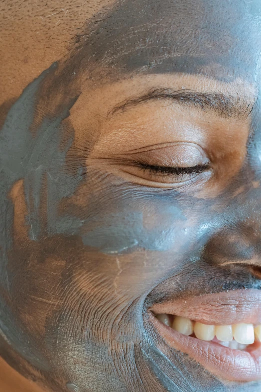 a close up of a person with a face mask, face and body features, smooth blending, happy face, grey