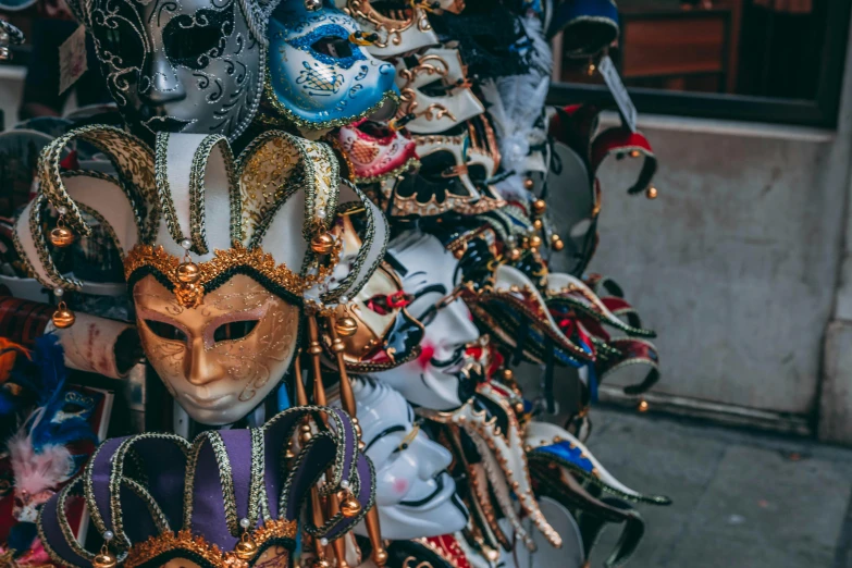 a group of masks sitting on top of each other, pexels contest winner, baroque, 🦩🪐🐞👩🏻🦳, gorgeous and huge head ornaments, multi chromatic, unsplash photo contest winner