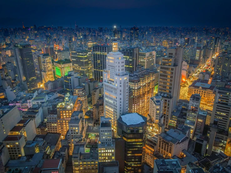 an aerial view of a city at night, by Luis Miranda, pexels contest winner, art nouveau, sao paulo, japanese downtown, large scale photo, youtube thumbnail