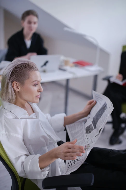 a woman sitting in a chair reading a newspaper, a cartoon, trending on pexels, female in office dress, androgynous male, girl with short white hair, business surrounding