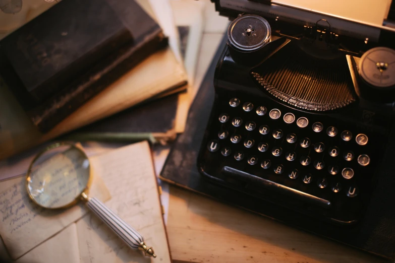 an old typewriter sitting on top of a table, a screenshot, by Carey Morris, pexels contest winner, flatlay book collection, black, brown, 15081959 21121991 01012000 4k