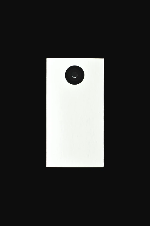 a white phone sitting on top of a black surface, a minimalist painting, by Shinji Aramaki, flickr, sōsaku hanga, keyhole, large happy eyes, bird eye view, ffffound