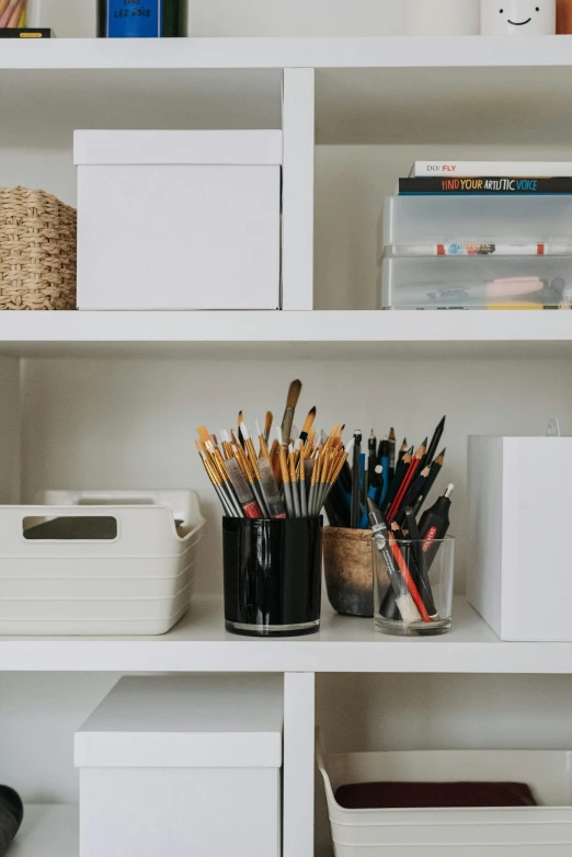 a white shelf filled with lots of office supplies, trending on unsplash, visual art, holding paintbrushes, high quality photo, dwell, ilustration