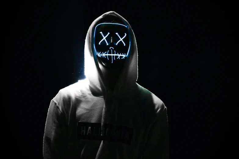 a person wearing a hoodie and a neon mask, pexels contest winner, white neon, modded, cross-eyed, headless