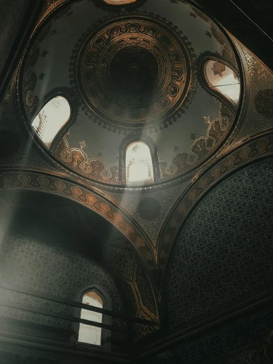 the sun shines through the windows of a church, a detailed matte painting, inspired by Elsa Bleda, unsplash contest winner, light and space, mosque synagogue interior, dark and moody aesthetic, shot from below, high res eautiful lighting