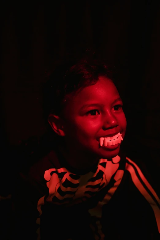 a young boy is brushing his teeth in the dark, inspired by Carrie Mae Weems, happening, performance, my son! the jaws that bite, video, grinning lasciviously