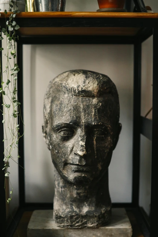 a sculpture of a man's head on a shelf, inspired by Diego Giacometti, trending on unsplash, new sculpture, tall thin frame, portrait of a handsome, singularity sculpted �ー etsy, portrait of a old